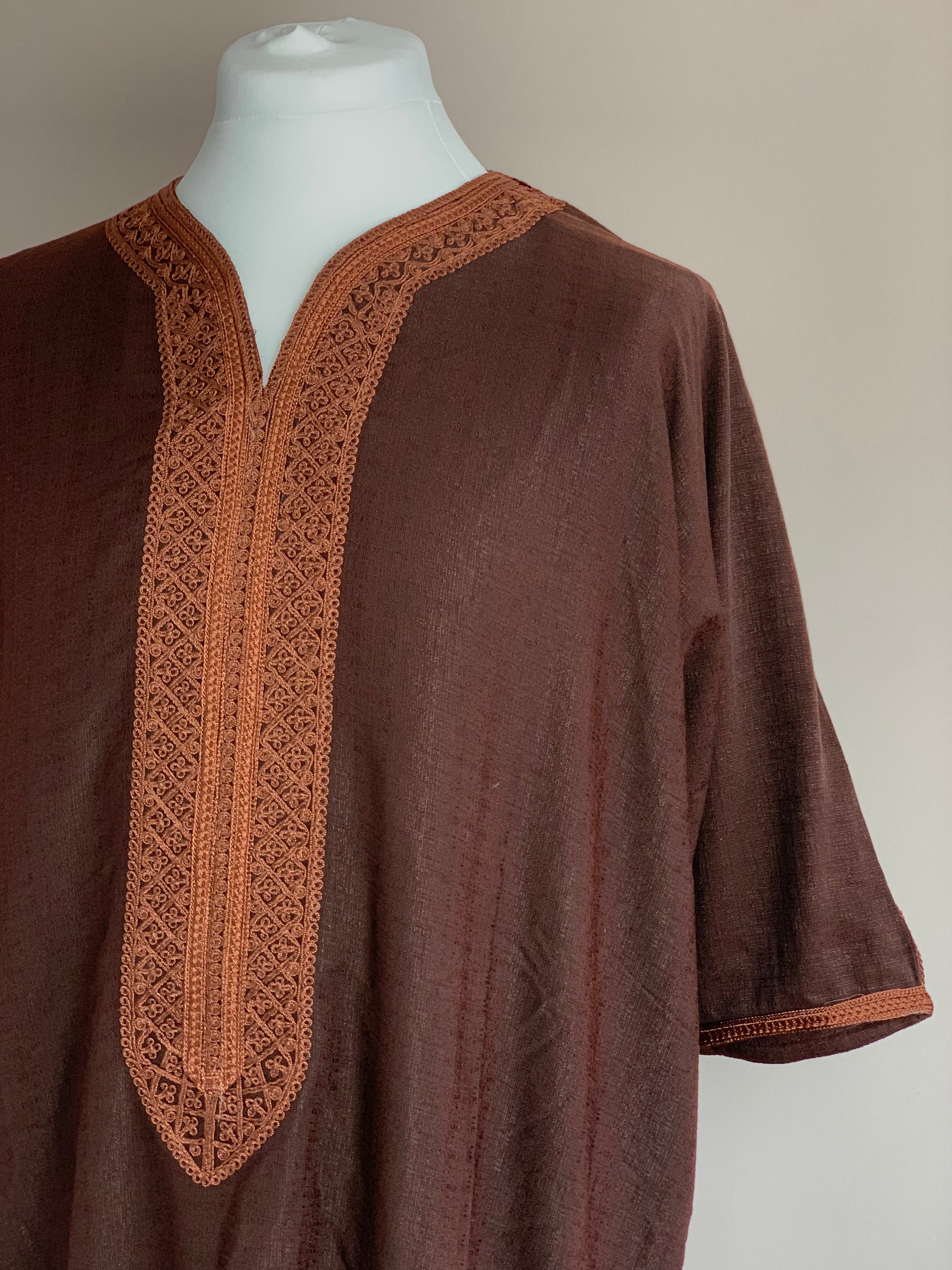 Brown and brown linen thobe arm view